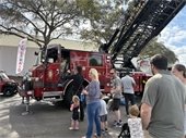 People lined up at the Fire Tower Truck for pictures